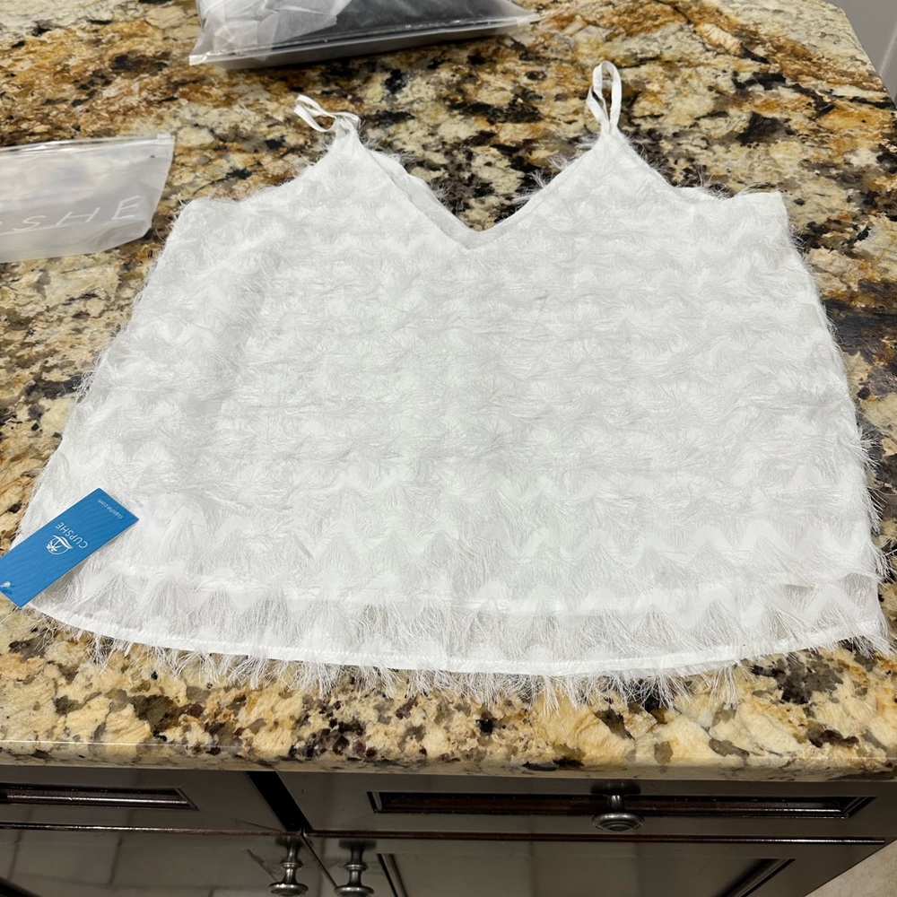 Fringe v neck cami with adjustable straps. Brand new.